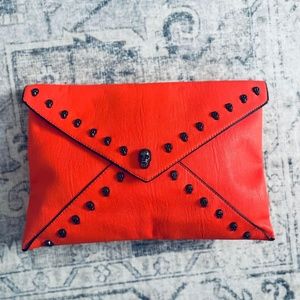 Orange Envelope Clutch with Skull Studs